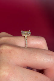 2.74ct E-VS1 Radiant Lab Diamond East West Ring. This is a traditional style engagement ring featuring a wrap under halo and east west radiant cut lab diamonds set into the band. The entire ring is made in solid 14k yellow gold.