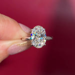 4.07ct D-VS1 Oval Lab Diamond Kayla Oval lab diamond solitaire in white gold with a wrap under halo and high polish plain band.