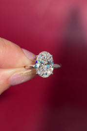 4.07ct D-VS1 Oval Lab Diamond Kayla Oval lab diamond solitaire in white gold with a wrap under halo and high polish plain band.