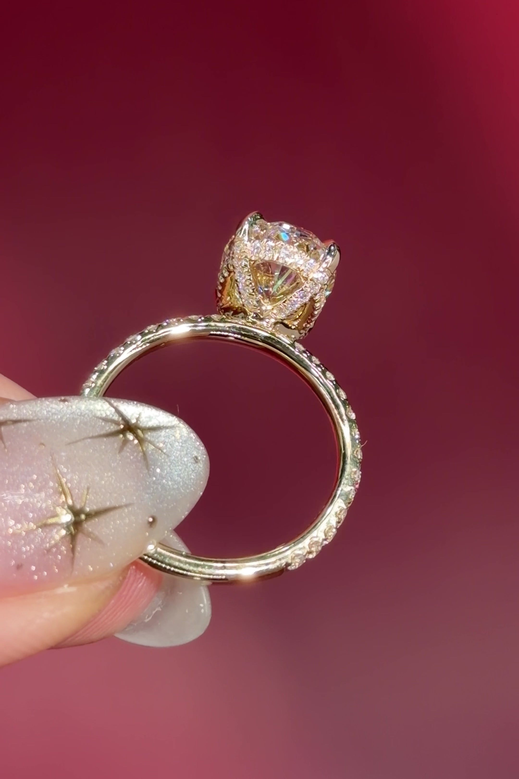 oval lab diamond engagement ring pavé band with diamond prongs and hidden halo