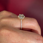 Round Solitaire Engagement Ring with Pavé Side Diamonds in yellow Gold with Petal Prongs