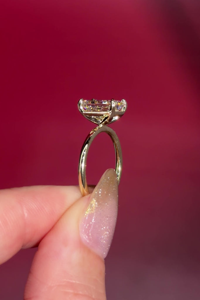 2.54ct F-VS1 Radiant Lab Diamond Leah. Simple and low maintenance, the Leah is a timeless solitaire designed for everyday wear. Crafted in solid 14k yellow gold, this traditional style features our classic belt design four prong head, offering added security while still maintaining one of the lowest maintenance settings we offer ✨