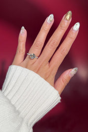 round lab diamond white gold pavé band engagement ring flower petal prong basket on hand