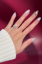 pear lab diamond yellow gold halo engagement ring pave band diamond petal prong basket on hand