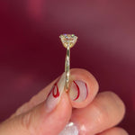 round yellow gold cathedral solitaire 4-prongs yellow gold on hand