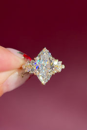 marquise lab diamond engagement ring yellow gold cluster side stones setting