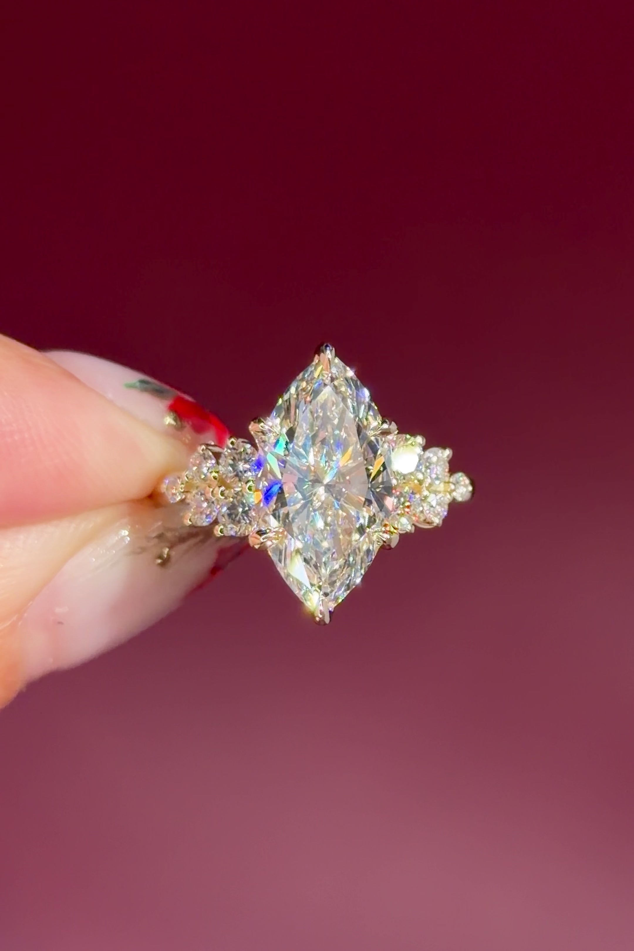 marquise lab diamond engagement ring yellow gold cluster side stones setting