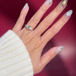 round lab diamond pave yellow gold engagement ring side stones trio on hand