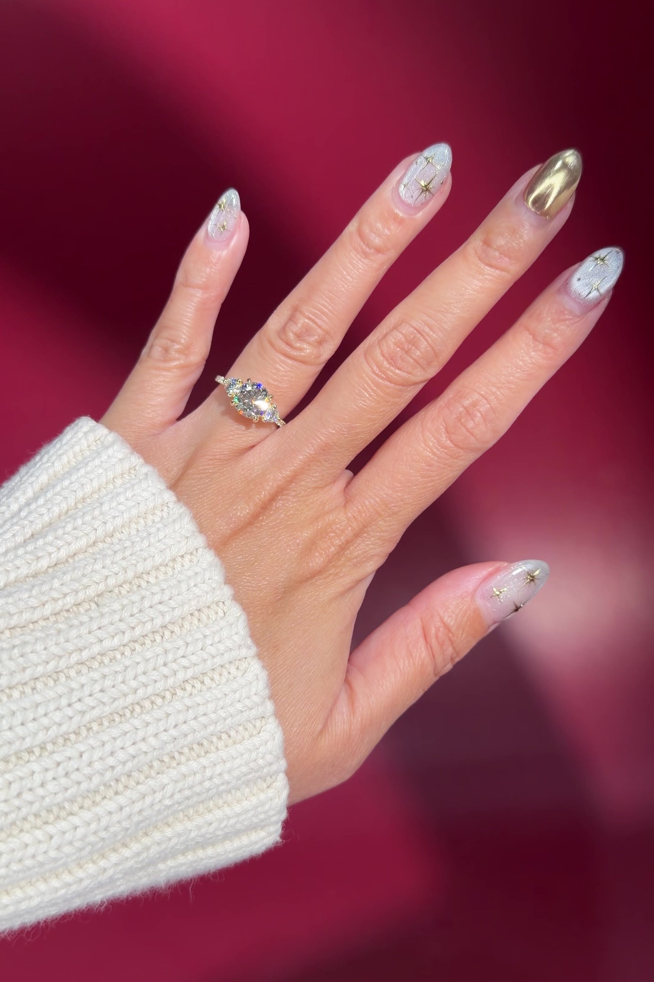 round lab diamond pave yellow gold engagement ring side stones trio on hand