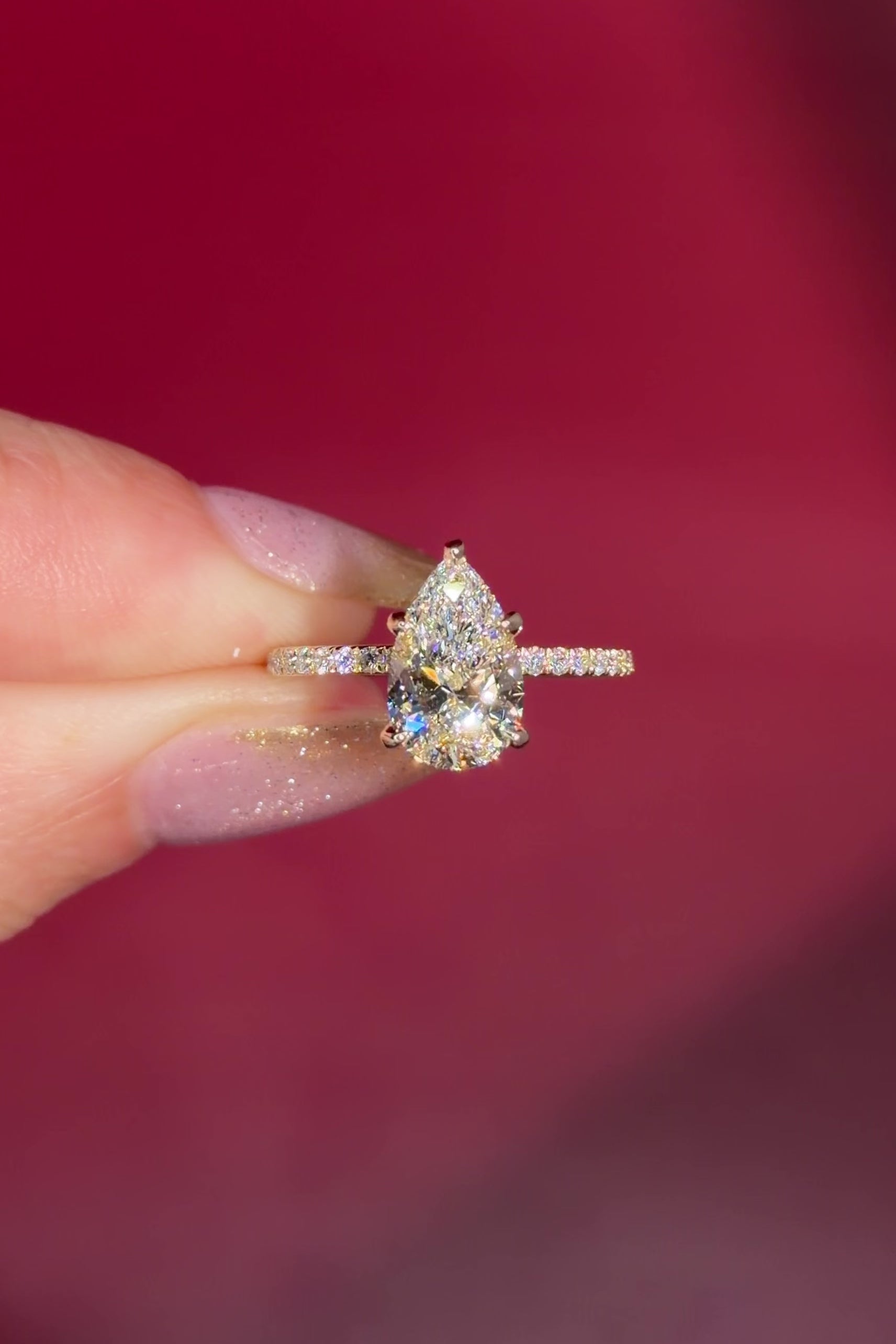 &nbsp;2.00ct D-VVS1 Pear Lab Diamond Kayla. The Kayla is a traditional style body engagement ring with a hidden halo that goes between the prongs, she showcases a classic comfort-fit band, subtly complemented by pave diamonds set on the band.