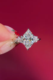 marquise diamond cluster white gold engagement ring