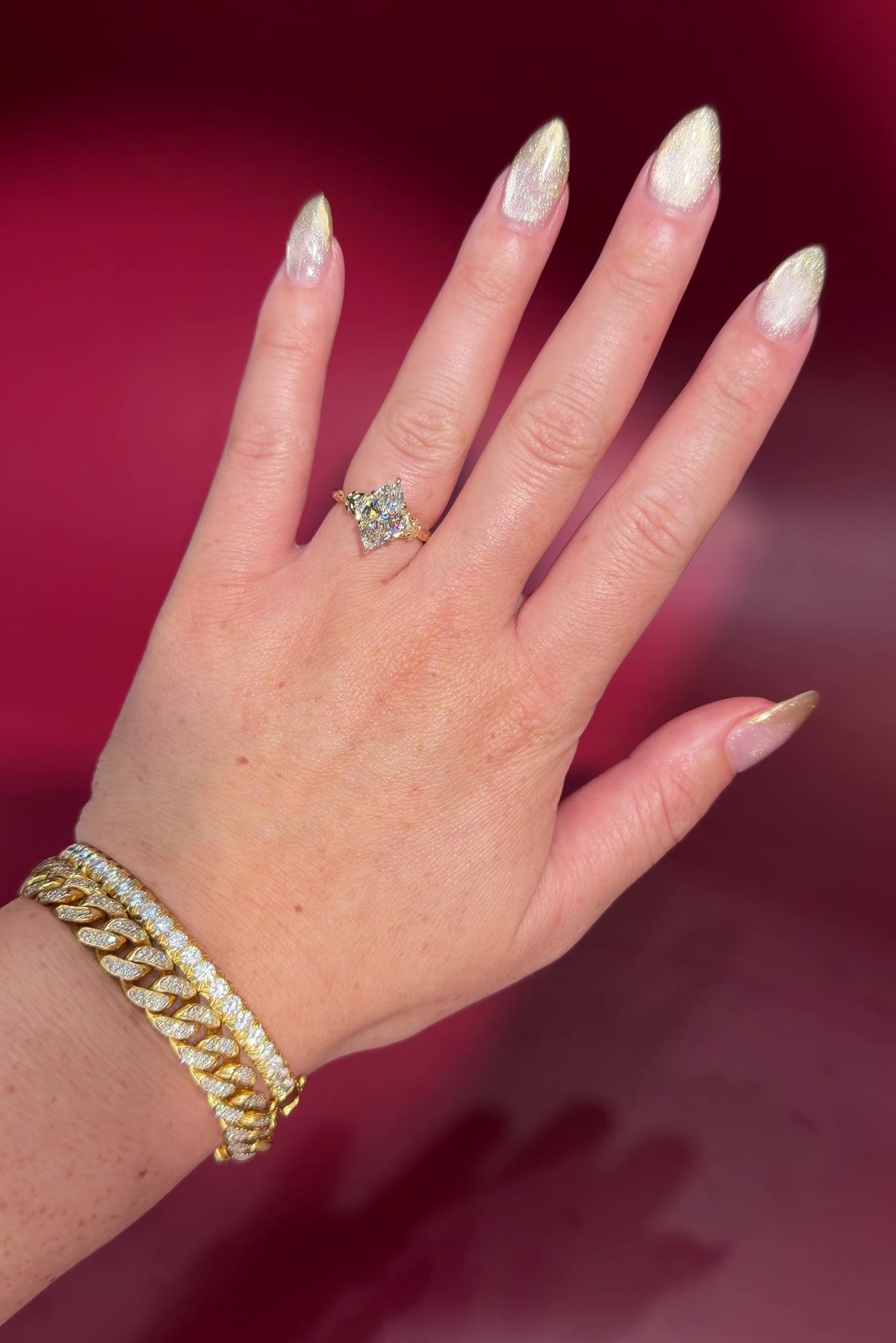 2.09ct D-VVS2 Marquise Lab Diamond Arwen. Nature inspired engagement ring with organic leaves made of gold going up the band to hold the center stone with petal prongs.