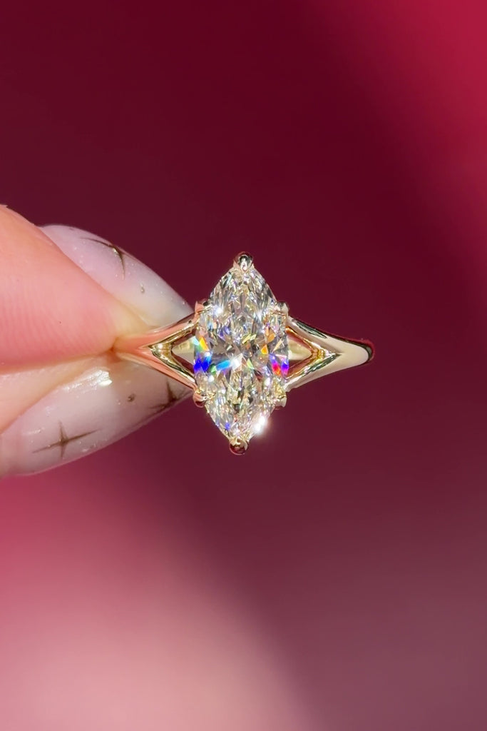 yellow gold marquise lab diamond solitaire split shank engagement ring