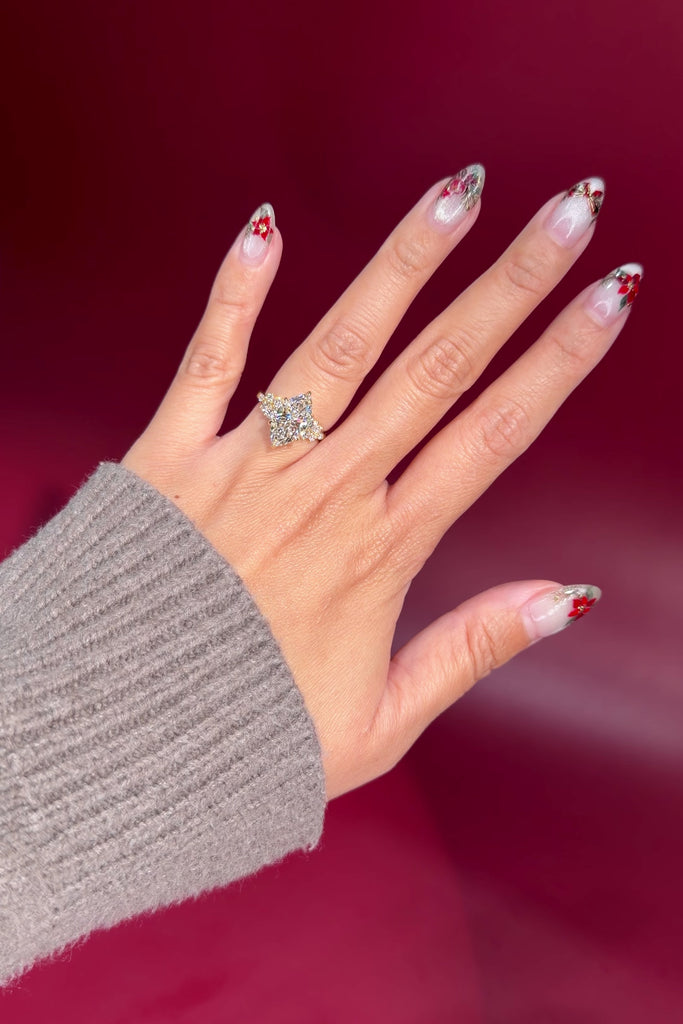 marquise lab diamond engagement ring yellow gold cluster side stones setting on hand