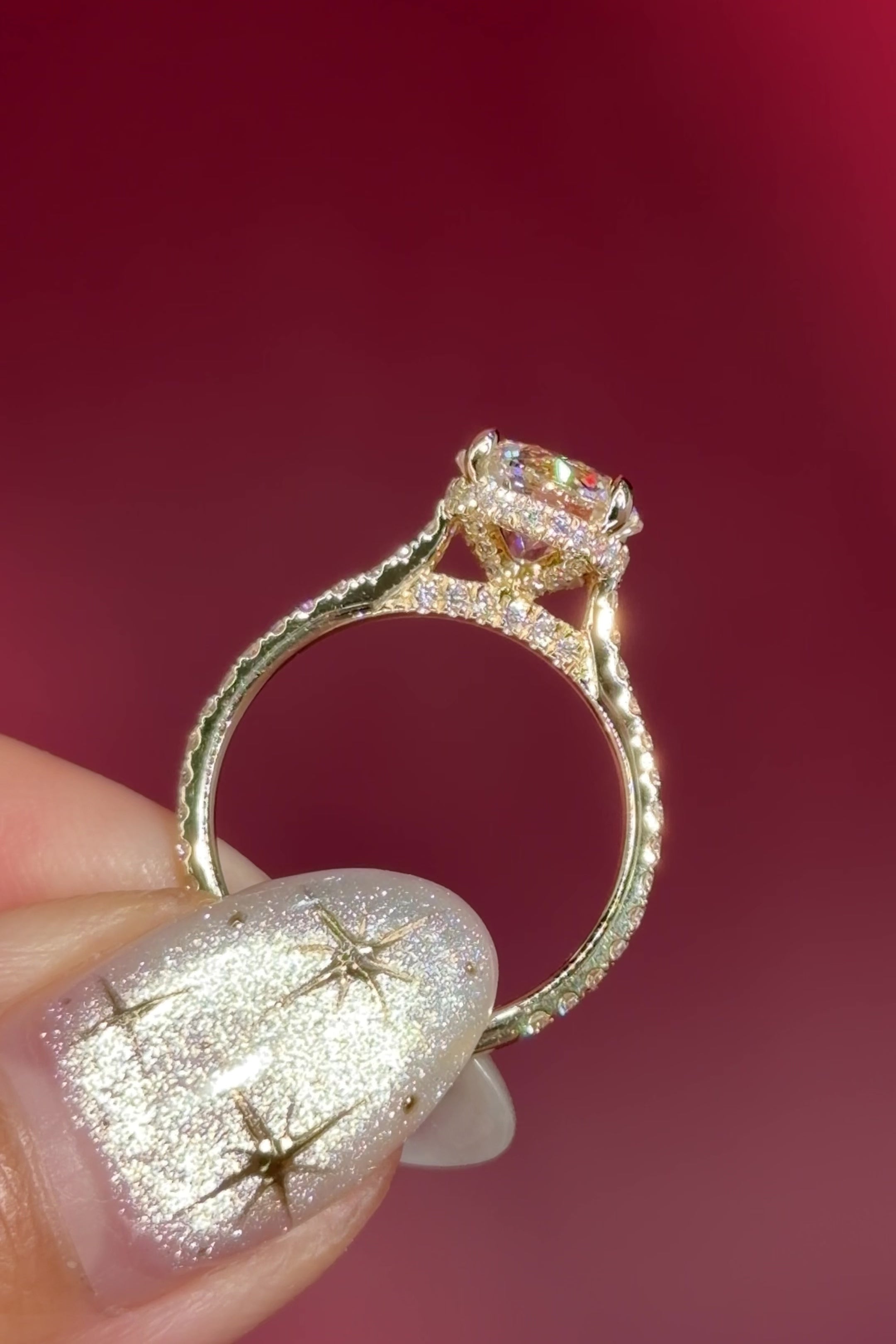 round lab diamond yellow gold engagement ring pavé with cathedral and diamond bridge and diamond prongs