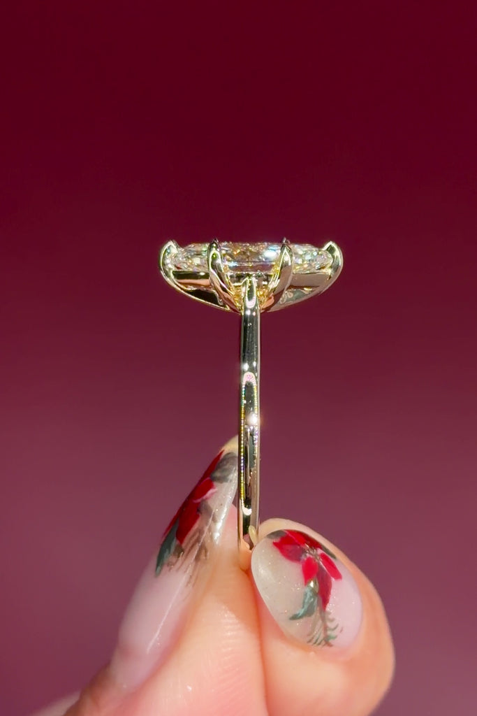 marquise lab diamond yellow gold cathedral setting high polish solitaire engagement ring profile view