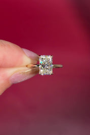 2.54ct F-VS1 Radiant Lab Diamond Leah. Simple and low maintenance, the Leah is a timeless solitaire designed for everyday wear. Crafted in solid 14k yellow gold, this traditional style features our classic belt design four prong head, offering added security while still maintaining one of the lowest maintenance settings we offer ✨