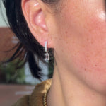 Emerald Diamond Drop Hoops White Gold with pave hoops dangle earrings with seamless click closure at princess bride diamonds in huntington beach california on model