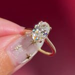 oval lab diamond yellow gold high polish engagement ring with cathedral and hidden halo