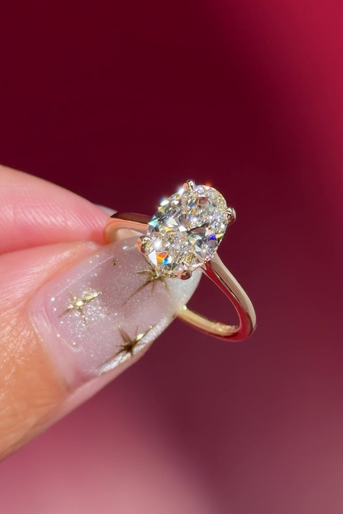 oval lab diamond yellow gold high polish engagement ring with cathedral and hidden halo