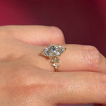 marquise lab diamond yellow gold engagement ring side stone cluster nature inspired on hand