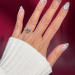 round lab diamond yellow gold engagement ring pavé with cathedral and diamond bridge and diamond prongs on hand