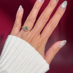 round lab diamond engagement ring leafy side marquise diamonds twist band engraved yellow gold on hand