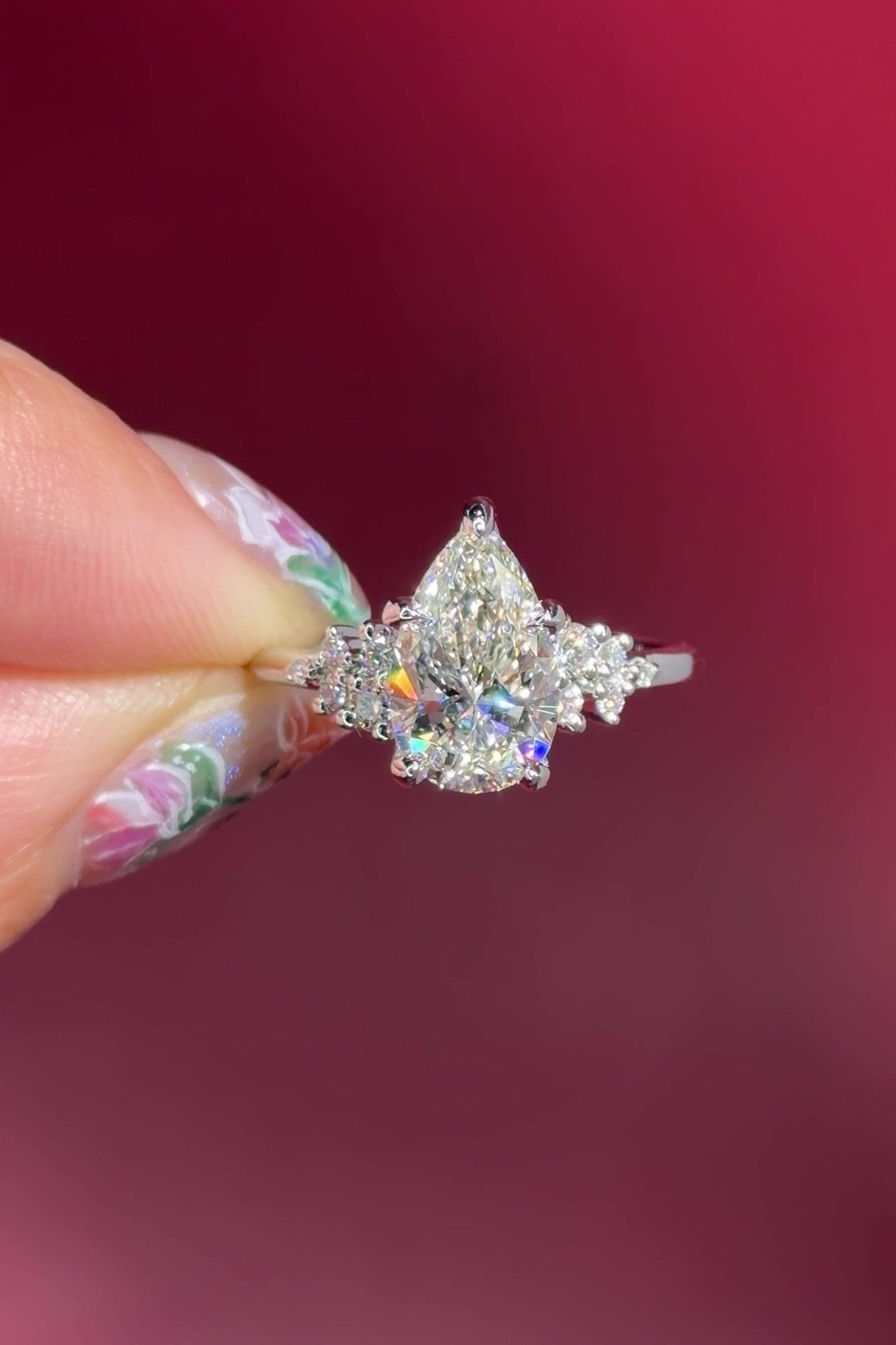 pear lab diamond nova engagement ring cluster side stones nature inspired white gold flower petal prong basket