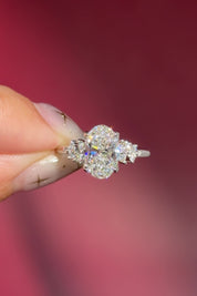 oval lab diamond engagement ring white gold side stones nature inspired cluster style