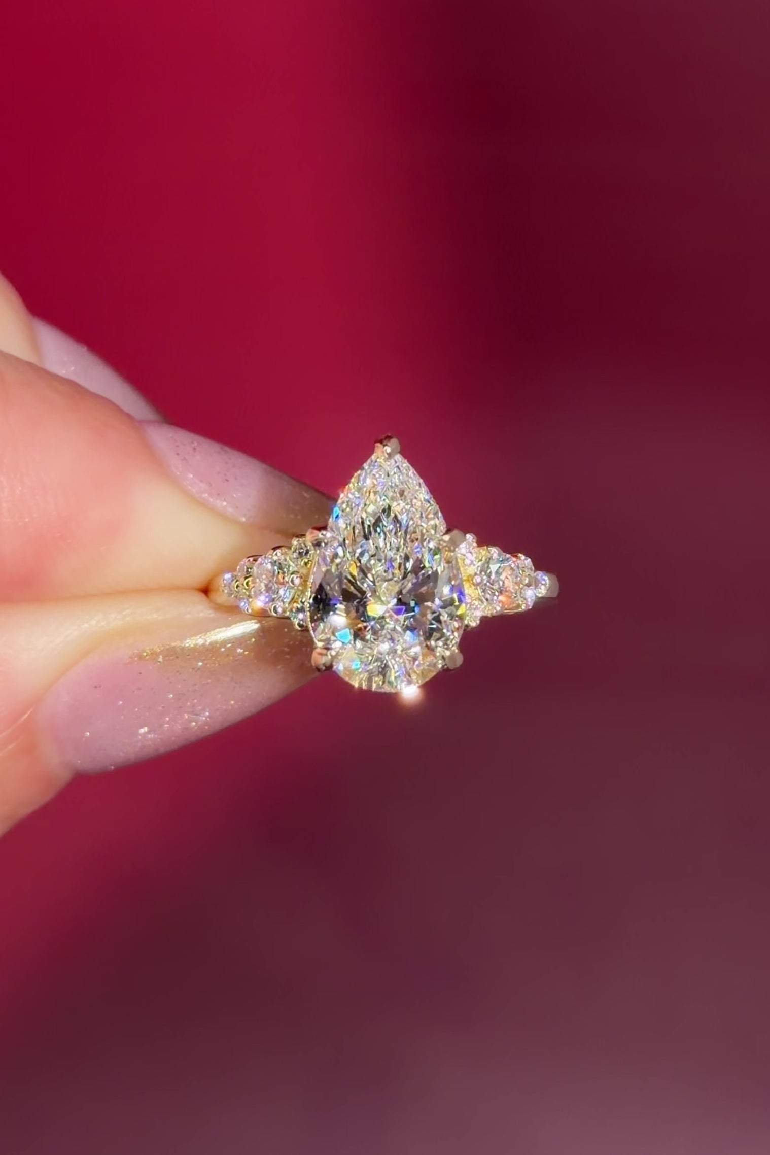 3.03ct D-VVS2 Pear Lab Diamond Brandi.

The Brandi is an inline style engagement ring featuring a symmetrical cluster of side diamonds that create a bold, sculptural look ✨

Because of its inline design, straight wedding bands will not stack flush. This style pairs best with a curved or custom wedding band, or it can be worn beautifully on its own without a wedding band at all 💛

A striking choice for those who love a statement engagement ring with intentional design details 💍