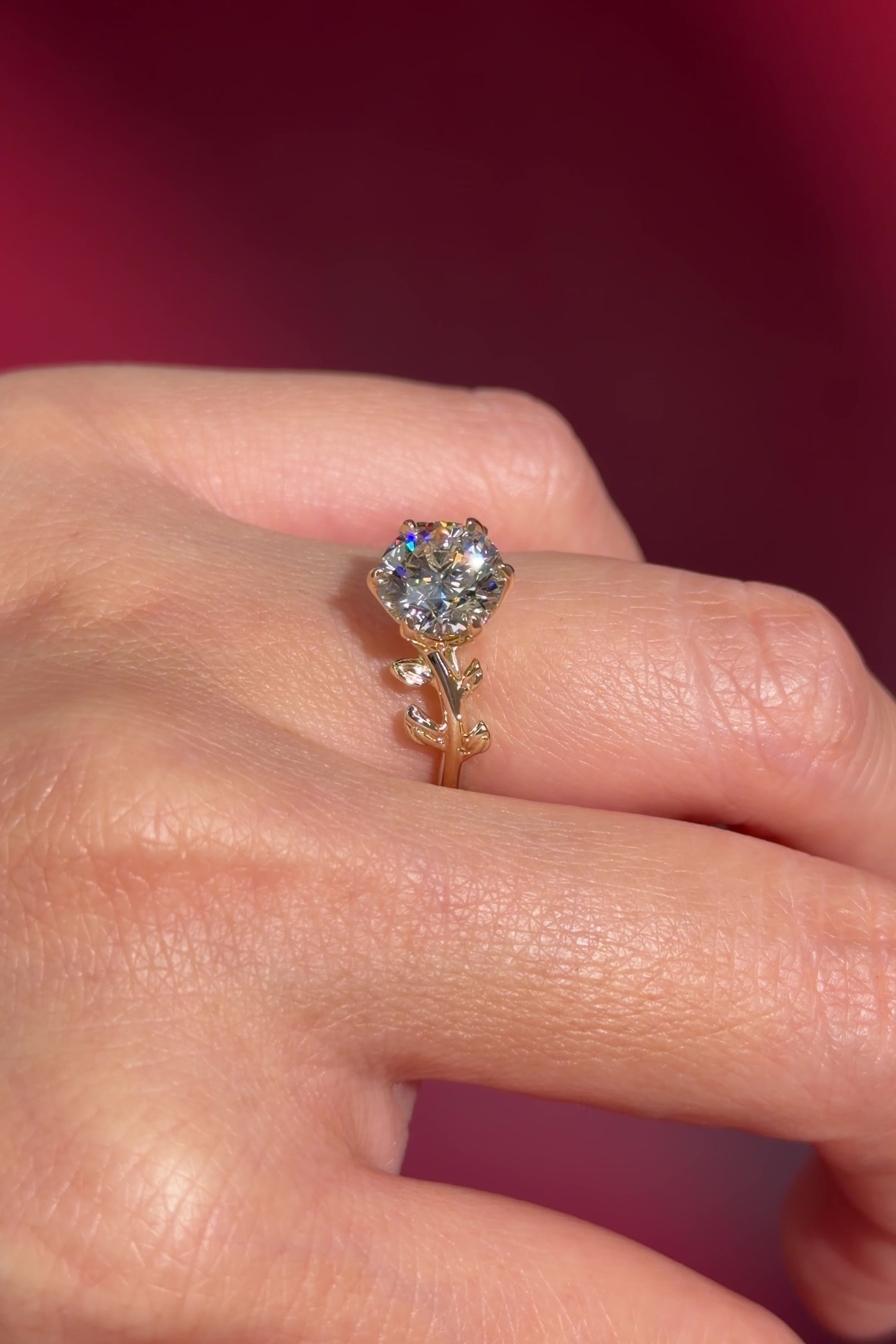 round lab diamond yellow gold engagement ring seaweed leaf nature inspired on hand