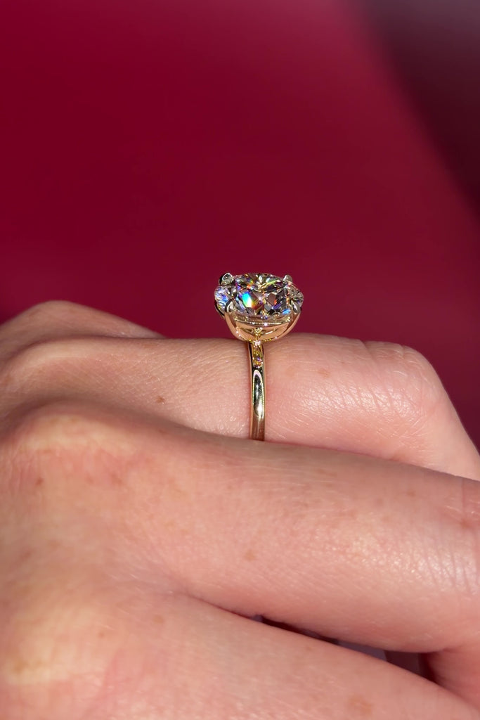 5.07ct E-VS1 Round Lab Diamond Leah. Simple and low maintenance, the Leah is a timeless solitaire designed for everyday wear. Crafted in solid 14k yellow gold, this traditional style features our classic belt design four prong head, offering added security while still maintaining one of the lowest maintenance settings we offer ✨