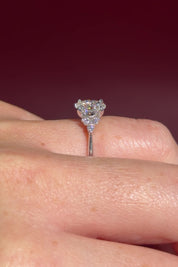 1.01ct D-VS1 Oval Lab Diamond Lindsey. The Lindsey features a classic high polish band with a trio of diamond side stones to perfectly accent your selected center stone.