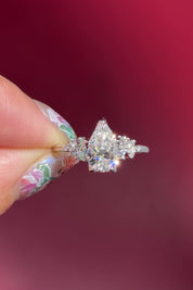 pear lab diamond cluster white gold nature inspired engagement ring with petal prong basket