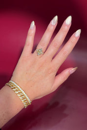 3.01ct F-VVS2 Marquise Lab Diamond Olivia. Three stone style engagement ring featuring two marquise and one round diamond at the bottom of the tro. The marquise act as diamond leaves holding the center stone. From the side profile the Olivia features a diamond bridge and diamond petal prongs.