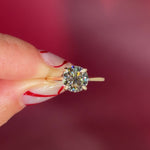 round yellow gold cathedral solitaire 4-prongs yellow gold on hand