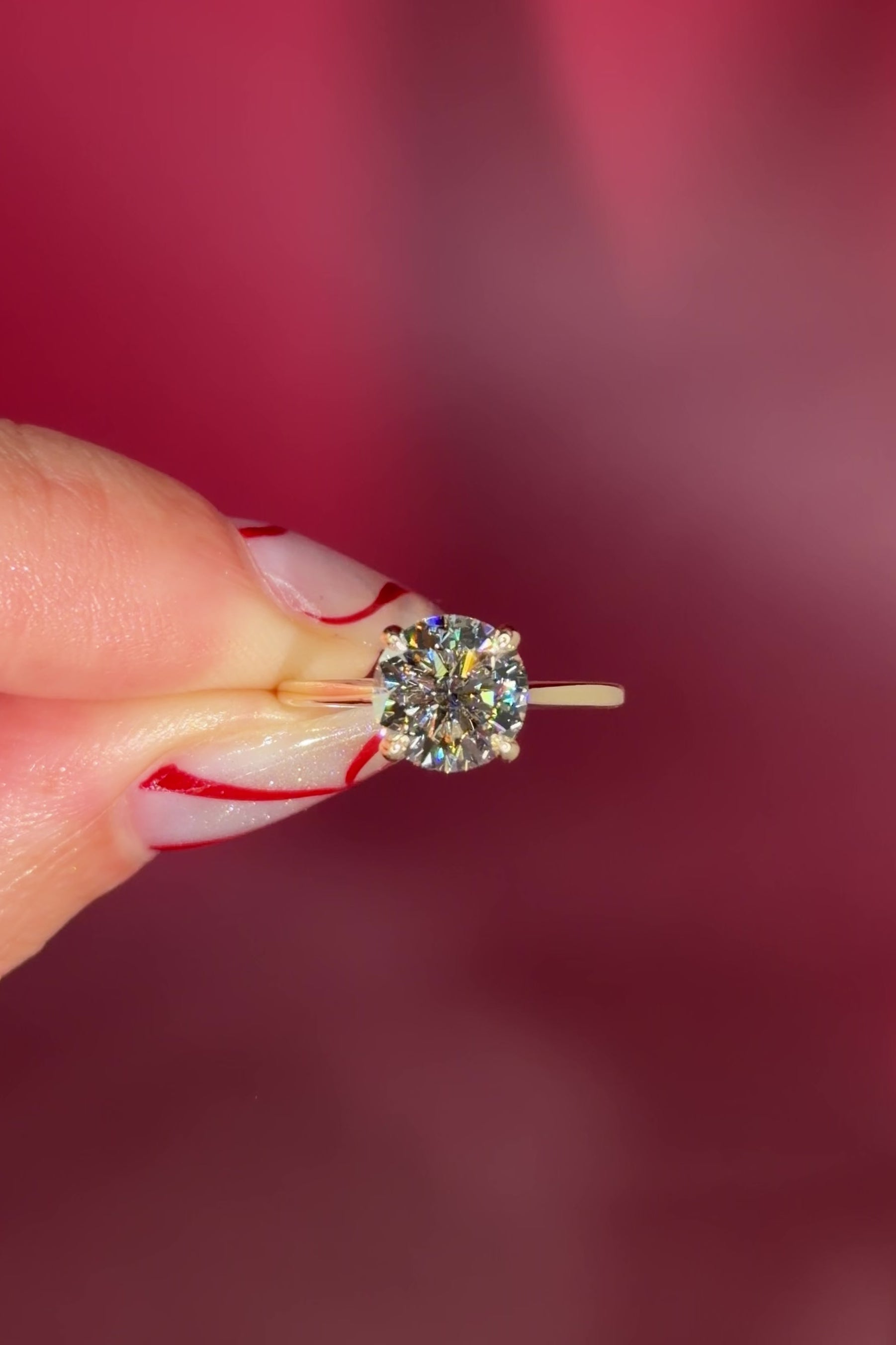 round yellow gold cathedral solitaire 4-prongs yellow gold on hand