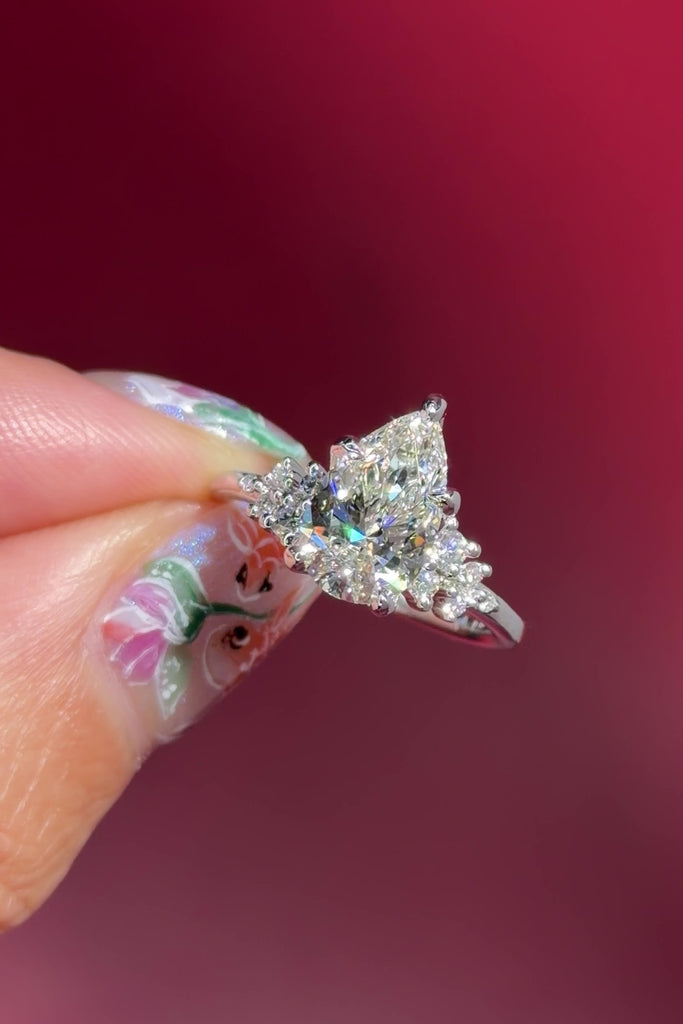 pear lab diamond nova engagement ring cluster side stones nature inspired white gold flower petal prong basket