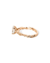 Angled view of the Rosette Oval Cathedral rose gold engagement ring with 75% eternity diamond band and romantic vintage-inspired design at Princess Bride Diamonds jewelry store in Orange County