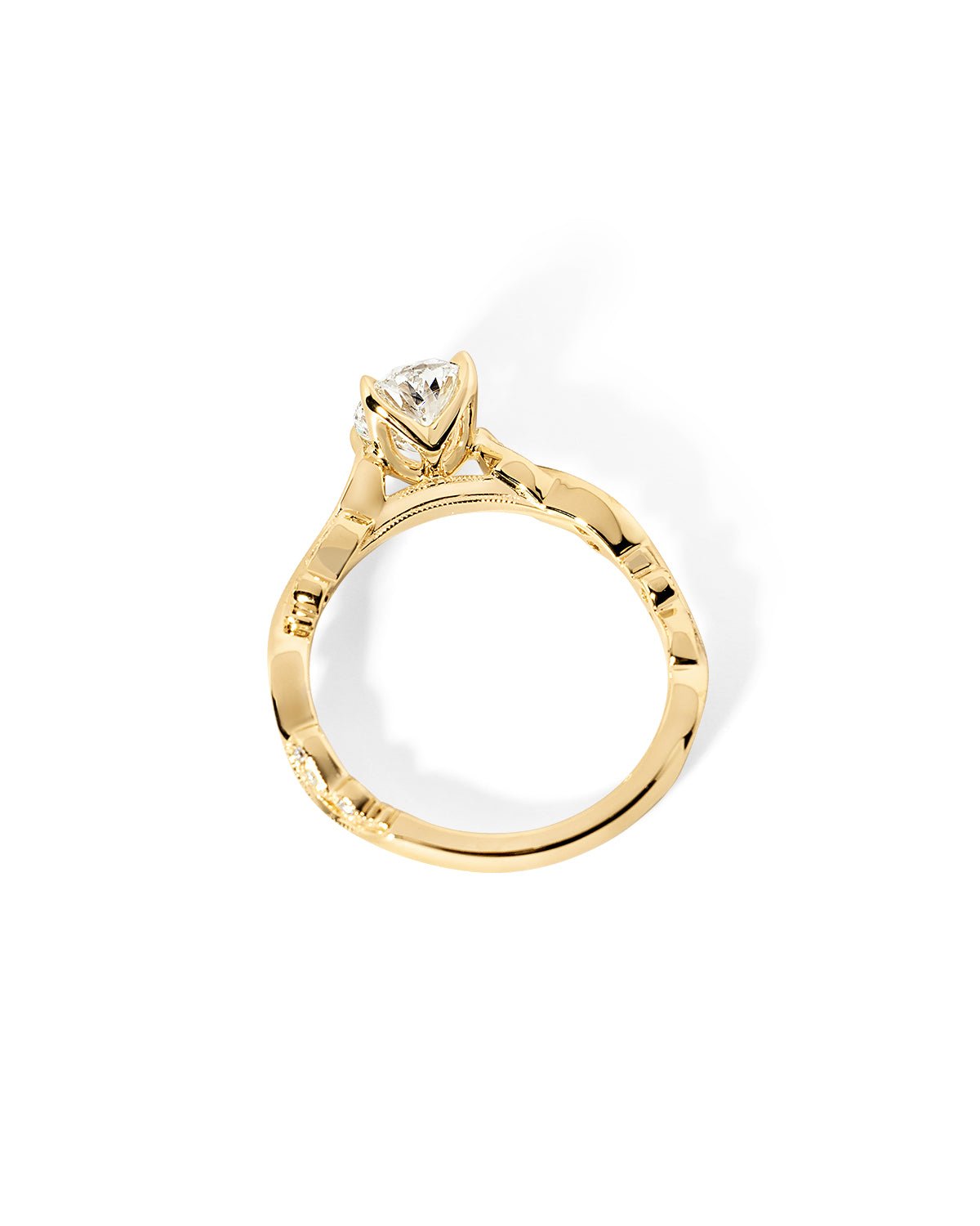 Side profile of the Rosette Oval Cathedral yellow gold engagement ring showing milgrain bridge and cathedral setting at Princess Bride Diamonds jewelry store in Orange County
