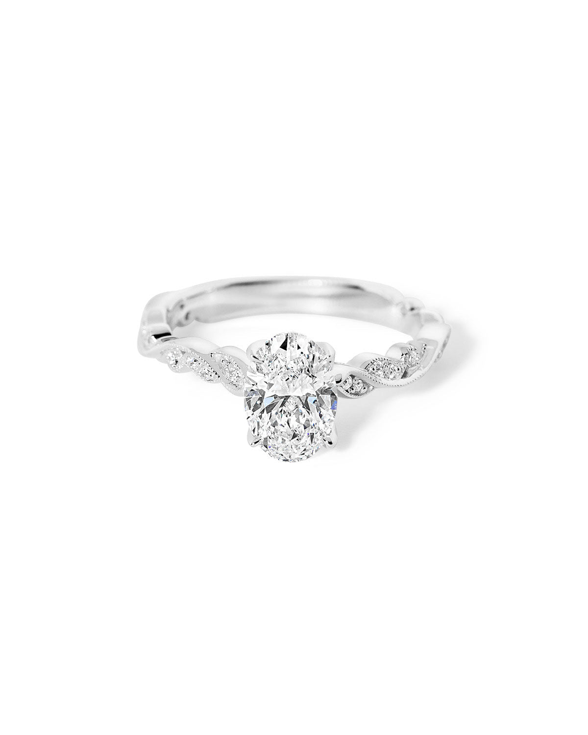 Rosette Oval Cathedral white gold engagement ring with oval center diamond and petal prongs at Princess Bride Diamonds jewelry store in Orange County
