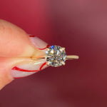 round yellow gold cathedral solitaire 4-prongs yellow gold