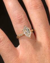 Victoria Dutch Marquise Hand Engraved engagement ring, worn on the hand in 14K yellow gold
