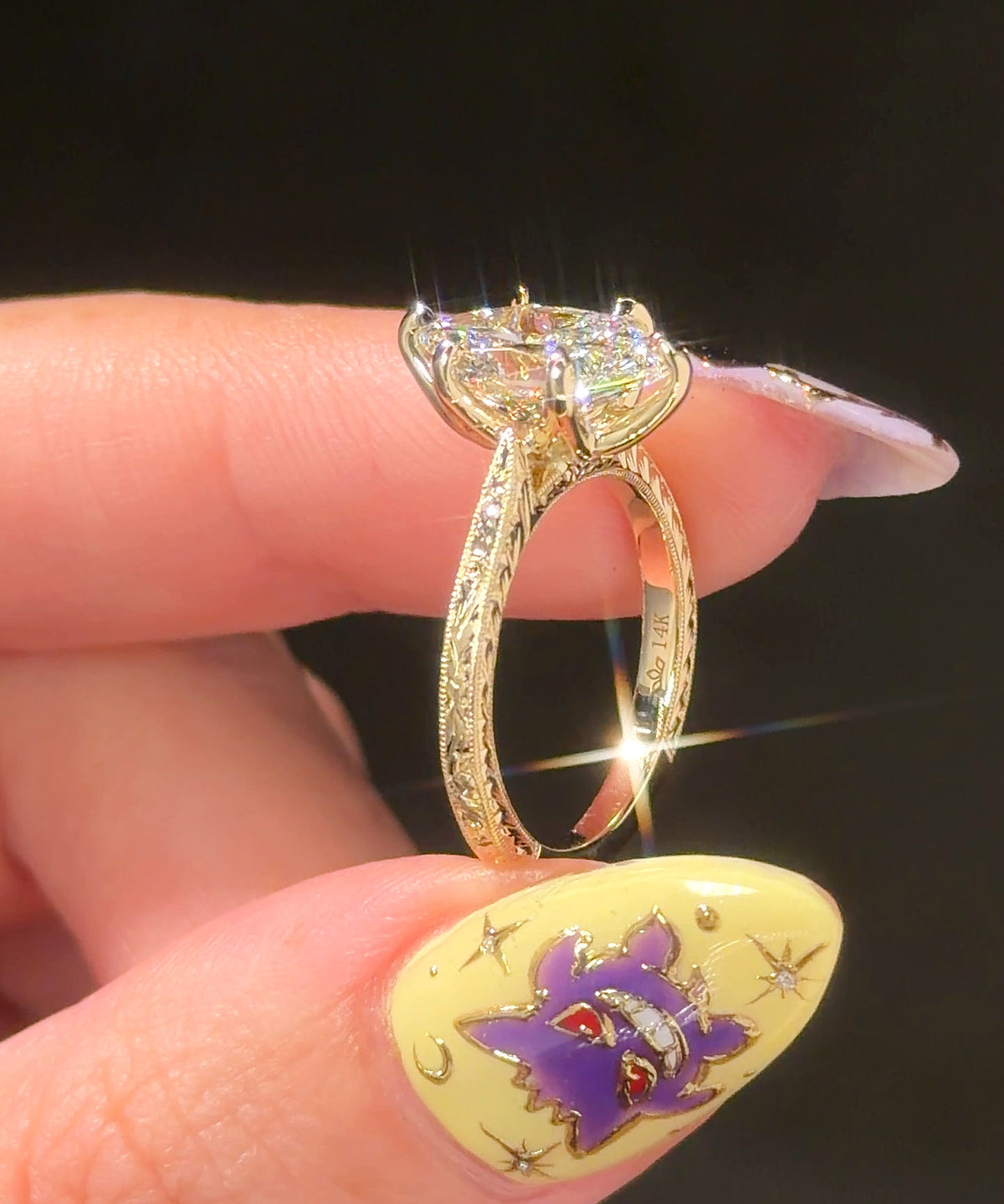 Victoria Dutch Marquise Hand Engraved engagement ring, side profile in 14K yellow gold