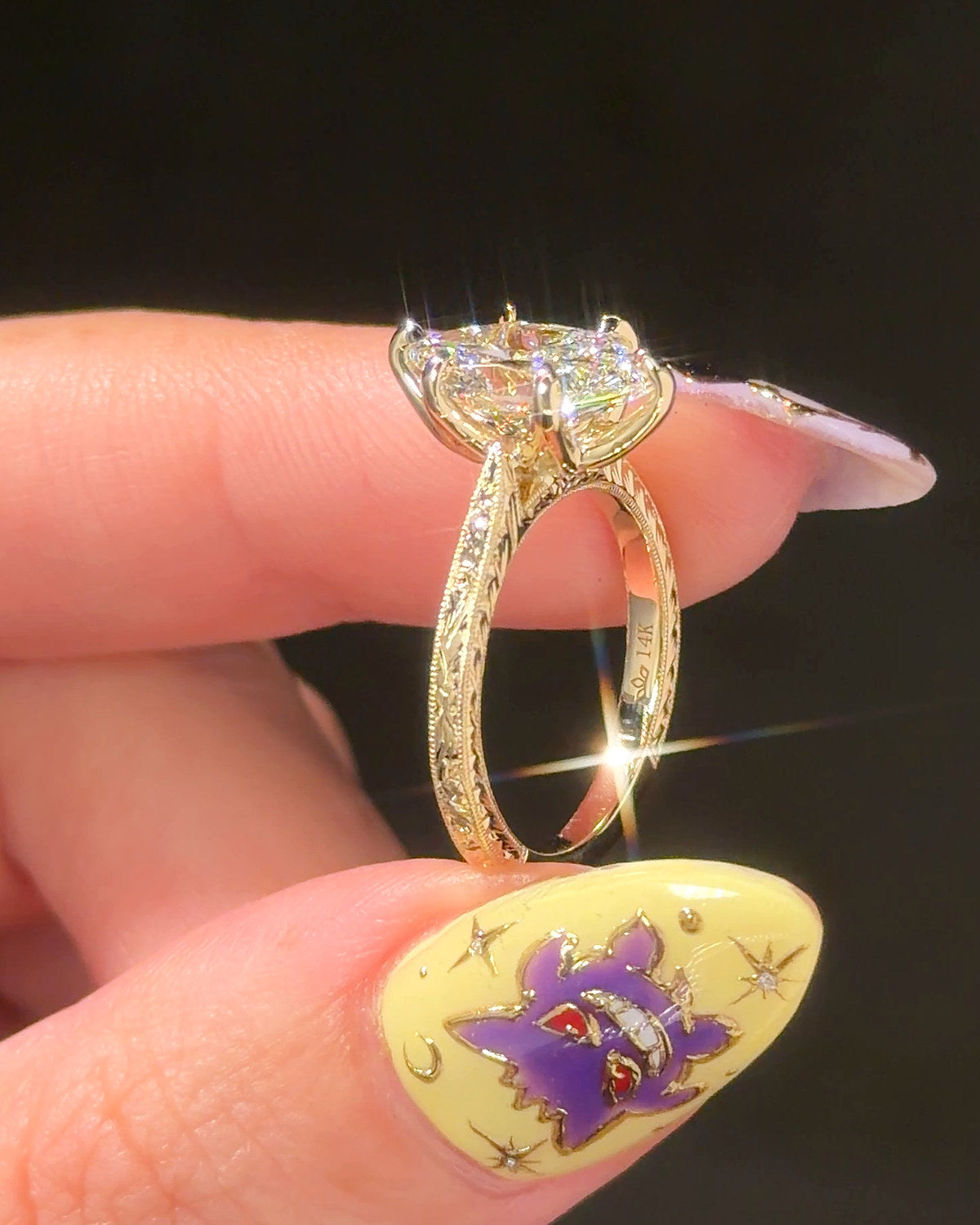 Victoria Dutch Marquise Hand Engraved engagement ring, side profile in 14K yellow gold