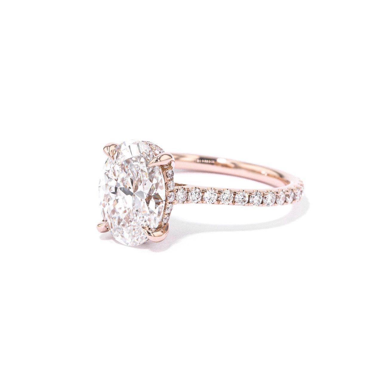 Oval cut diamond engagement ring in rose gold